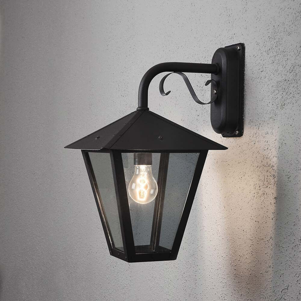 Benu outdoor wall lamp black, smoked acrylic glass mounted on a wall