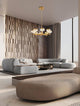 Bion LED Pendelleuchte 8-flammig Ø 80,7cm 3000K Gold in modernem Wohnzimmer mit eleganten Sofas.