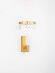 Bion LED Wandleuchte Ø 14,8cm 3000K Gold an der Wand, elegantes Design für moderne Innenräume.
