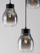 Blacu Pendelleuchte 3-flammig Schwarz in elegantem Design mit glasklaren Lampenschirmen.