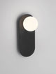 Blob Wandleuchte G9 an einer Wand montiert mit elegantem Design und sanftem Licht.