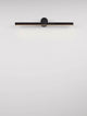 Breggo Wandleuchte 61cm 3000K IP54 an einer weißen Wand, modernes und elegantes Design.