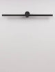 Breggo Wandleuchte 81cm 3000K IP54 in Schwarz an einer weißen Wand