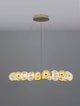 Brille LED Pendelleuchte 12-flammig Ø 94cm 3200K Gold in moderner Innenraumbeleuchtung