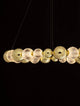 Brille LED Pendelleuchte 12-flammig Ø 94cm 3200K Gold, elegante Goldleuchte mit klaren Glaskugeln.