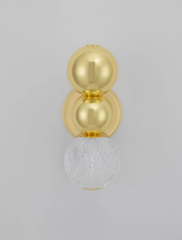 Brille LED Wandleuchte 3200K Gold mit goldenen und gläsernen Elementen für moderne Wohnräume.