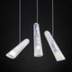 Brokis Hängeleuchte Flutes 15° mit elegantem, konischen Design in einem modernen Innenraum.