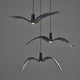 Brokis Hängeleuchte Night Birds waagrechte Flügel 78cm in Rauchgrau - stilvolle Pendelleuchte für modernes Ambiente.