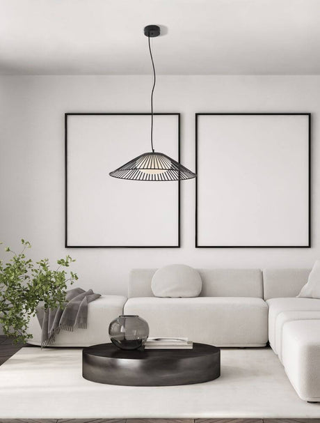Brume LED pendant light 3000K black in a modern living room with stylish furniture.