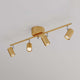 Deckenstrahler Correct 4-flammig in Gold mit verstellbaren Lichtköpfen, ideal für Flur oder Schlafzimmer.