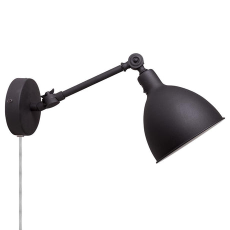 Lampada da parete da lettura Bazar Mini nero sabbia con braccio regolabile e superficie nero opaco.