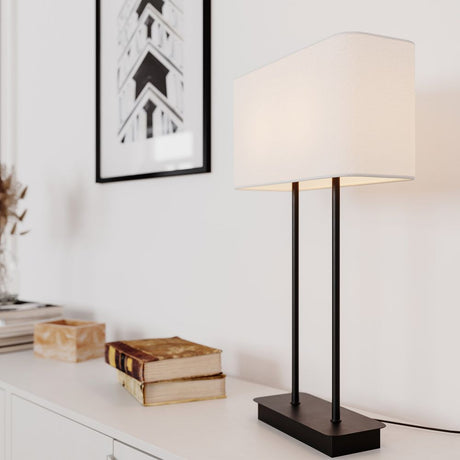 Modern table lamp Luton White with black base and white lampshade, ideal for stylish interiors.