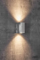 Canto Maxi Kubi 2 Wandleuchte IP44 auf Betonwand mit dualem Lichtstrahl
