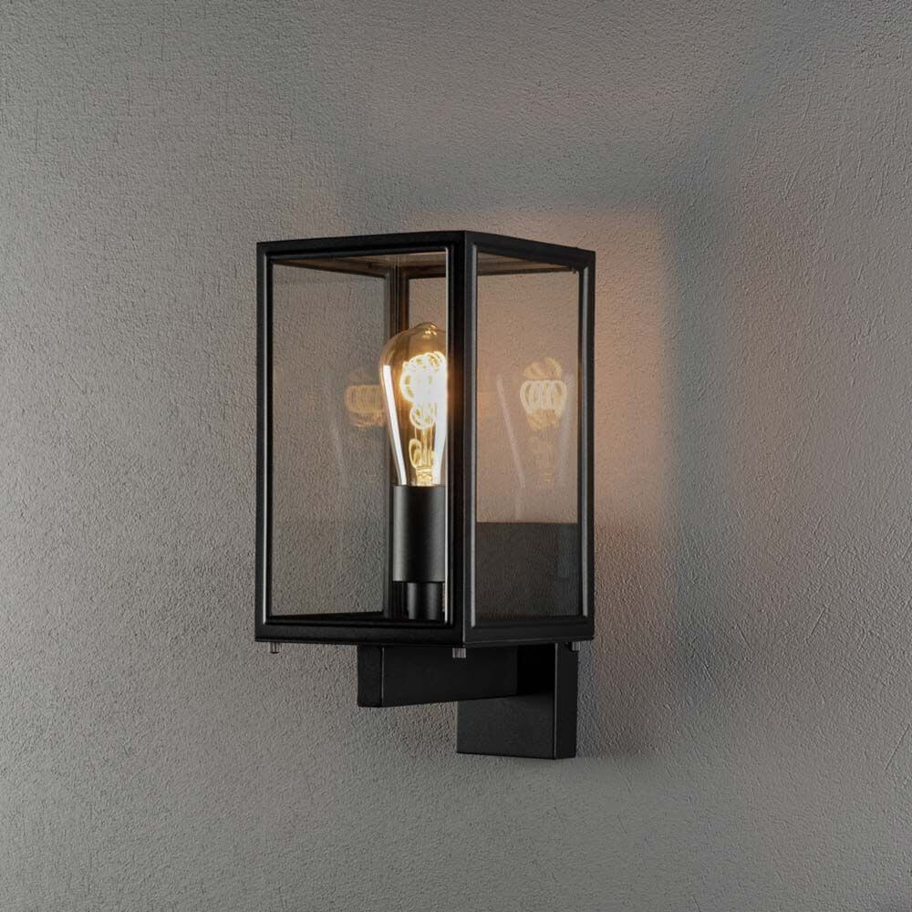 Carpi Wandleuchte Laterne in Schwarz mit klarem Glas und Stahlrahmen, montierbar nach oben und unten.