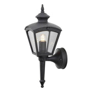 Cassiopeia outdoor wall light black, smoked acrylic glass mounted on the wall with illuminated interior.