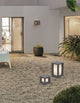 Castro Außensockelleuchte E27 IP65 im modernen Garten, ideal für Außenbereiche und Terrasseneinrichtungen.