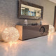 Moderne Einrichtung mit Catellani & Smith Fil de Fer F LED Bodenelementen und Spiegel in stilvollem Raum.