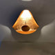 Catellani & Smith Lederam Manta CWS1 LED Wand- & Deckenlampe in goldener Farbe an der Wand montiert.