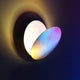 Catellani & Smith Lederam W 25 LED Wandleuchte mit buntem Lichtspiel und elegantem Design.