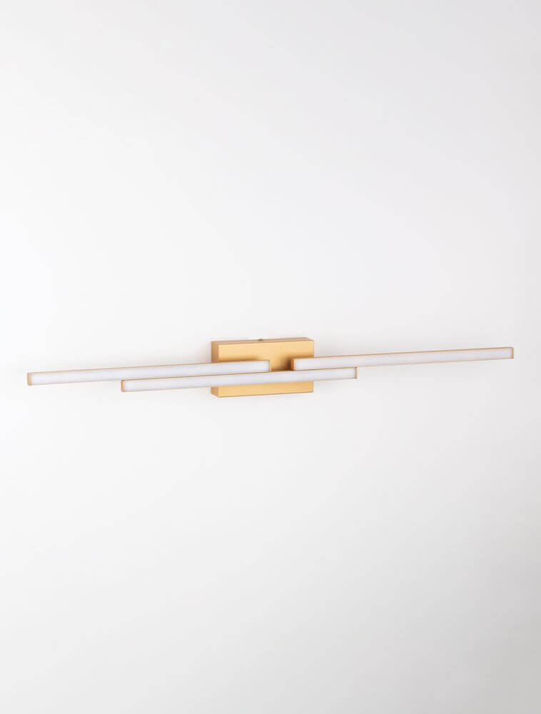 Chart LED Wandleuchte 3-flammig 3000K in mattem Gold mit modernem Design an einer Wand