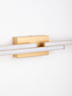 Chart LED Wandleuchte 3-flammig 3000K in elegantem mattem Gold an einer Wand montiert.