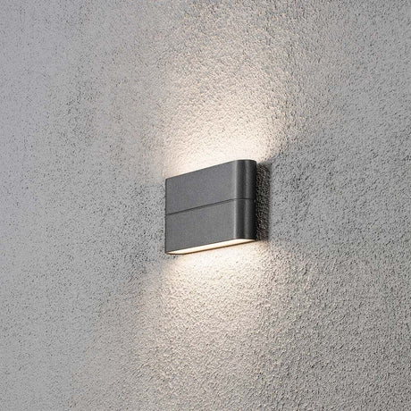 Chieri LED outdoor wall light anthracite, opal acrylic glass mounted on a grey wall.