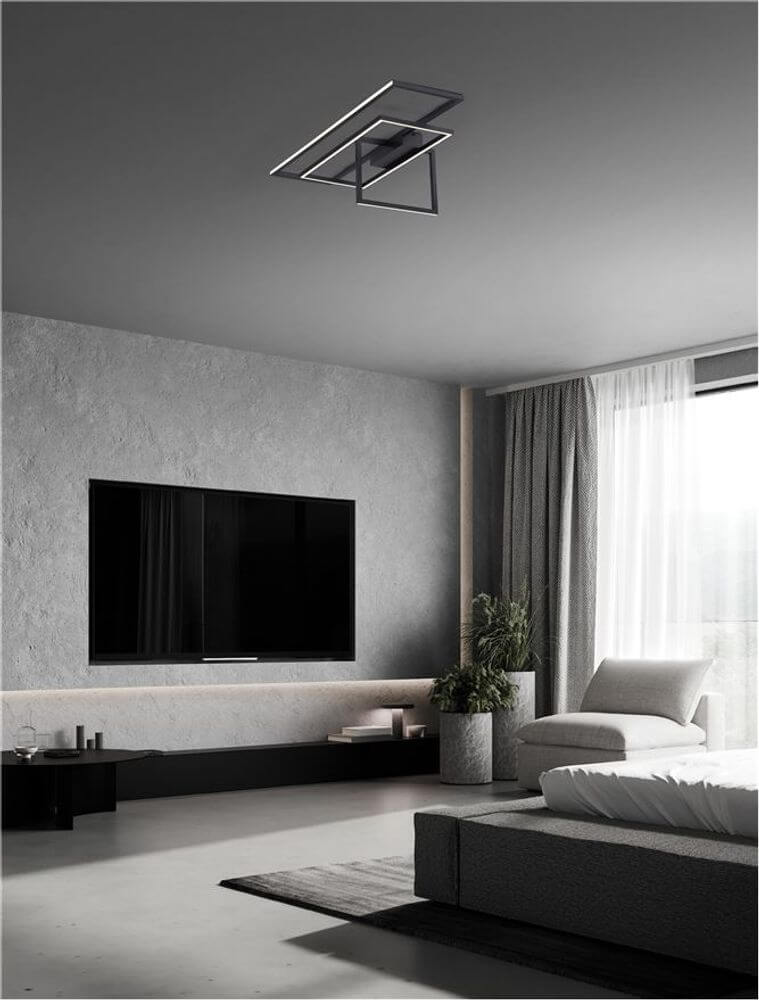 Clea LED Deckenleuchte 70cm 2-flammig 3000K über einem modernen Wohnzimmer mit großem Fenster