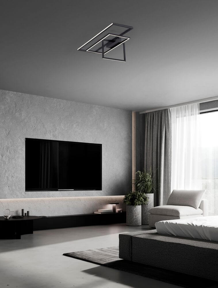 Clea LED Deckenleuchte 92cm 3-flammig 3000K im modernen Wohnraum mit Fernseher.