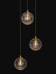 Coen Pendelleuchte 3-flammig Ø 25cm Gold, Transparent, elegante Hängelampe mit glasierter Oberfläche.