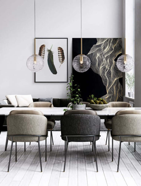 Coen pendant light Gold, Transparent above dining table in modern interior, matte gold socket, 3-bulb glass lamps