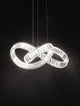 Conceto LED Pendelleuchte Verknotet Ø 60cm 3500K mit luxuriösem Design und funkelnden Kristallen.