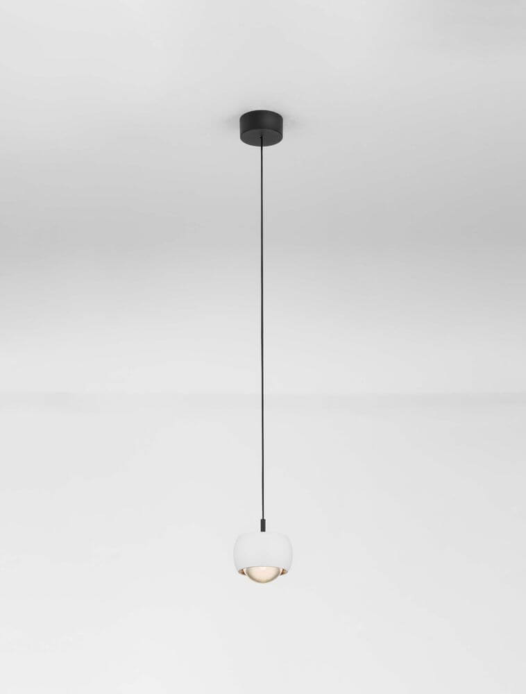 Conga LED Pendelleuchte Ø 9,6cm 3000K wirkt modern und stilvoll in einem minimalistischen Raum.