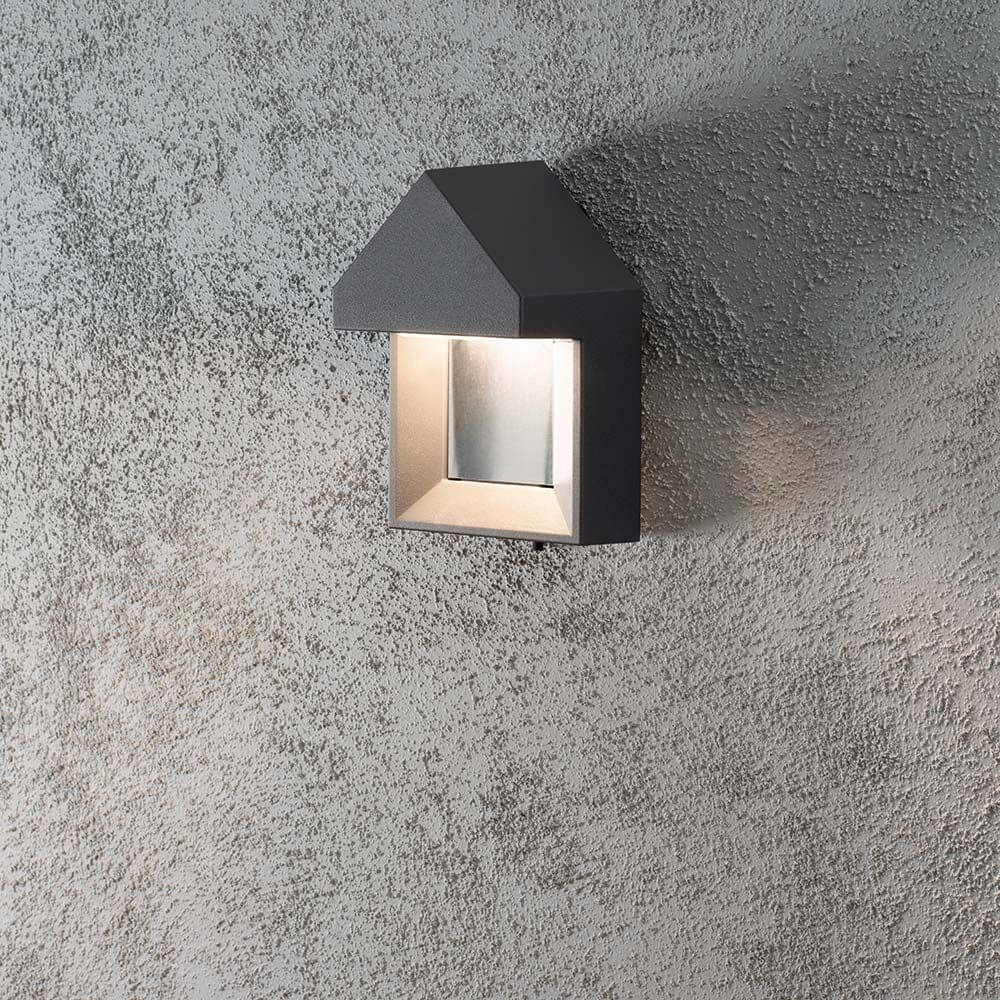 Cosenza LED Außen-Wandleuchte Anthrazit an einer strukturierten Wand montiert.