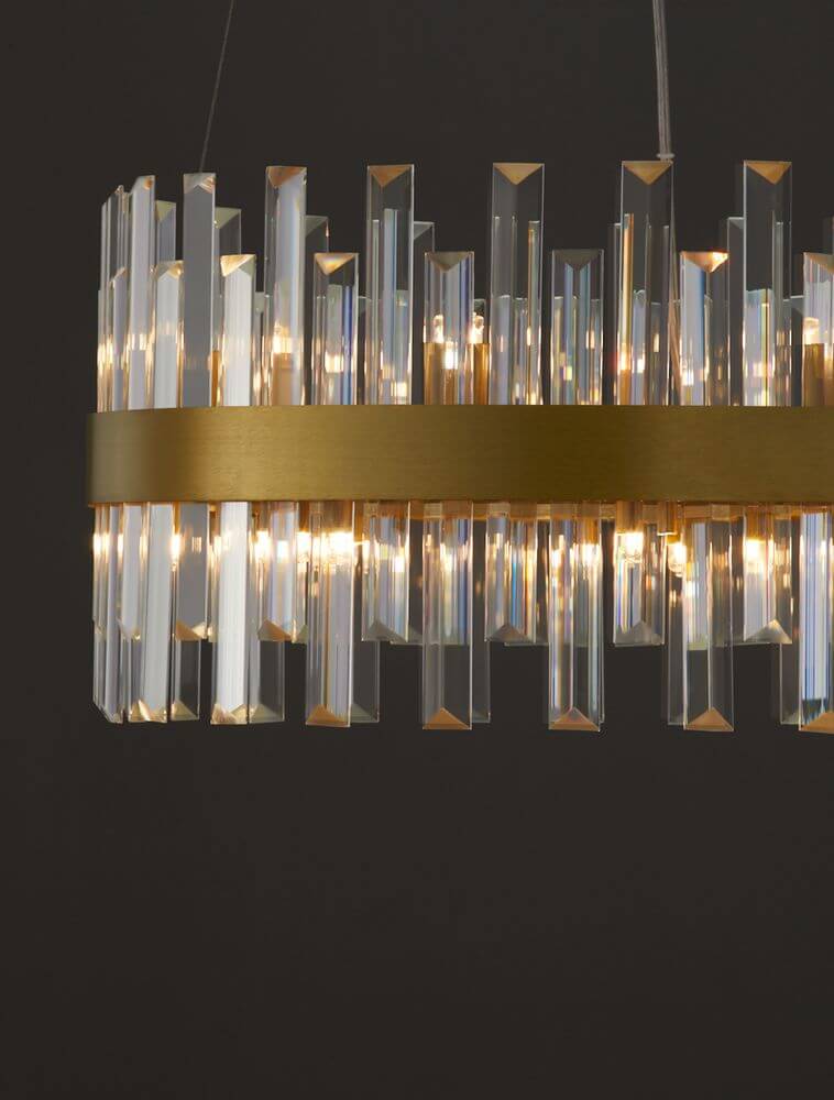 Crown Pendelleuchte 7-flammig Ø 55cm Gold-Satiniert mit Kristallen und goldener Metallfassung.