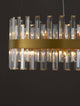 Crown Pendelleuchte 7-flammig Ø 55cm Gold-Satiniert mit Kristallen und goldener Metallfassung.