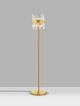 Crown Stehlampe Gold mit gläsernem Lampenschirm und elegantem Design auf grauem Hintergrund.