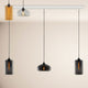 s.luce Cruet Pendellampe mit vier Glasleuchten in modernem Design, ideal für Ess- und Wohnbereiche.