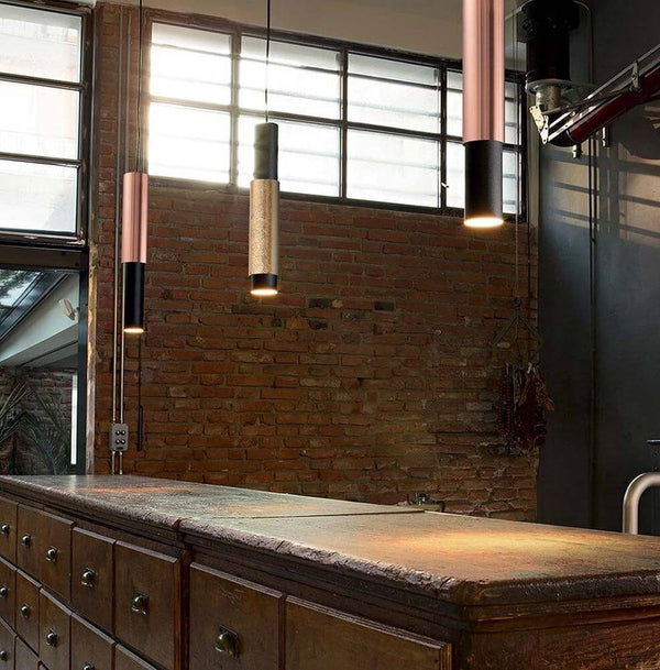 s.luce Crutch pendant lamp 1-phase track 200 cm end feed over an antique wooden counter with brick wall