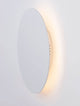 Cyrcle LED Wandleuchte Ø 22cm 3000K an der Wand installiert mit warmem Licht.