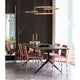 Eleganter Esstisch mit DCWéditions Broche LED Kronleuchter und stilvollen Stühlen in modernem Ambiente.