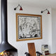 LAMPE GRAS N°304 L40 Wandleuchte von DCW éditions in modernem Wohnraum mit Kunstwerk und Kamin.
