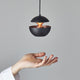DCWéditions Here Comes The Sun Ø 10cm Mini LED-Pendelleuchte mit einzigartigem Lichtaustritt und modernem Design.