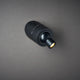 DCWéditions Vision 20/20 LED-Wandleuchte Schwarz auf dunklem Hintergrund, elegant und funktional.