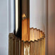 DCWéditions Wandleuchte In The Tube 120-1300 Detailansicht mit Röhre und reflektierender Struktur.