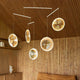 DCWéditions Focus LED Hängeleuchte mit 3 leuchtenden Scheiben in modernem Raumdesign.
