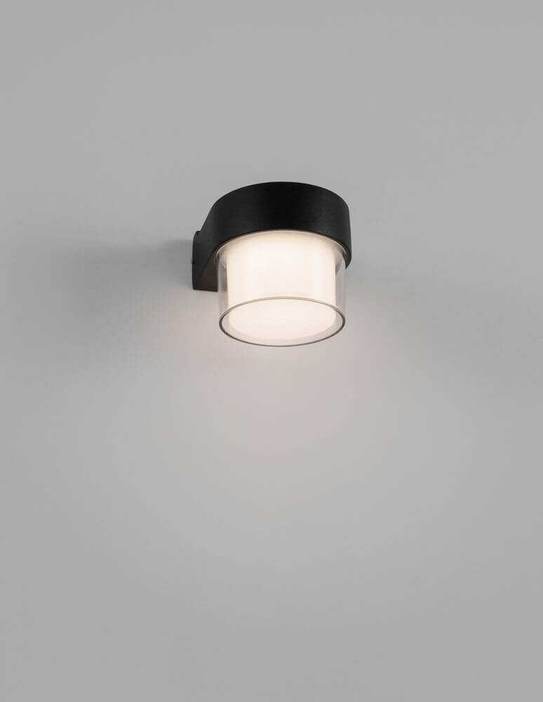 Darf LED Außenwandleuchte Downlight 3000K Schwarz IP54 an einer Wand montiert, minimalistisches Design.