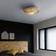 Deckenleuchte Kuulto 9100 aus Holz 52cm in modernem Schlafzimmer mit stilvollem Design und warmem Licht.