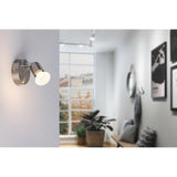 Wandstrahler Carolina Chrom, modernes einflammiges Spotlight mit schwenkbarem Spotkopf, ideal für vielseitige Wohnsituationen.