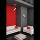 Deckenstrahler LINK GU10 11W Weiß in modernem Wohnzimmer mit roter Wand und weißen Möbeln.