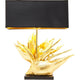 Dekorative Tischleuchte Tropical Flower mit goldener Strelitzien-Blüten-Skulptur und schwarzem Lampenschirm.